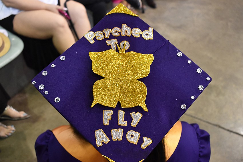 Erinn Lee shows off her decorated cap at the Booker High School Graduation on June 3 at Robarts Arena.