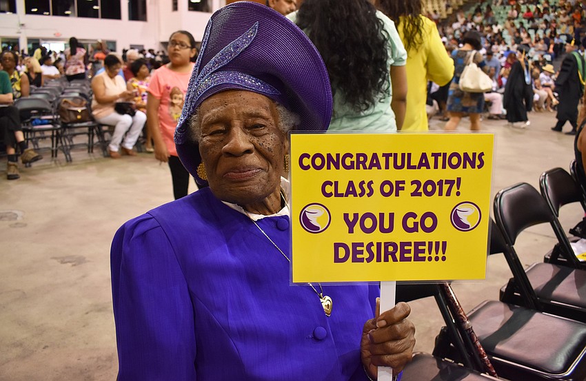 Carrie Weeks, who recently celebrated her 95th birthday, shows her pride for her great-granddaughter before the Booker High School Graduation on June 3 at Robarts Arena.