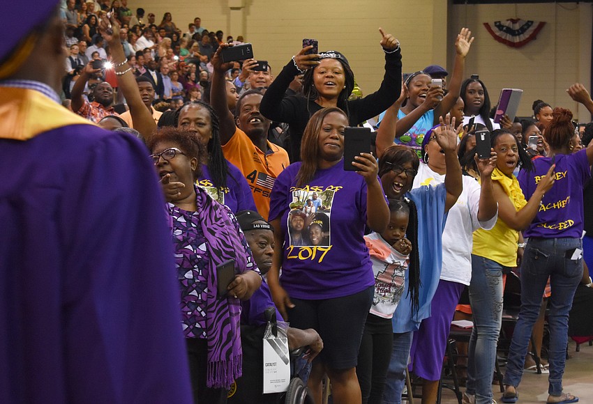 Your Observer Photo The spirited crowd cheers for graduates during