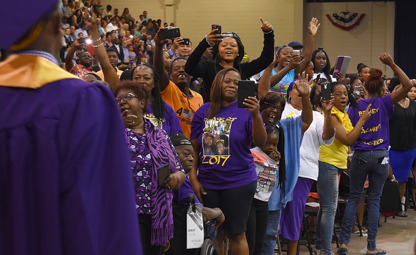 The spirited crowd cheers for graduates during the Booker High School Graduation on June 3 at Robarts Arena.