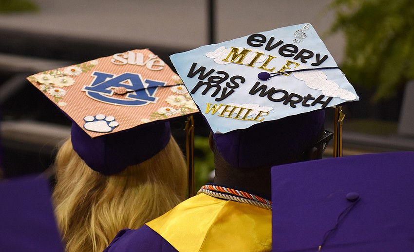 Students show off their creativity via their graduation caps during the Booker High School Graduation on June 3 at Robarts Arena.