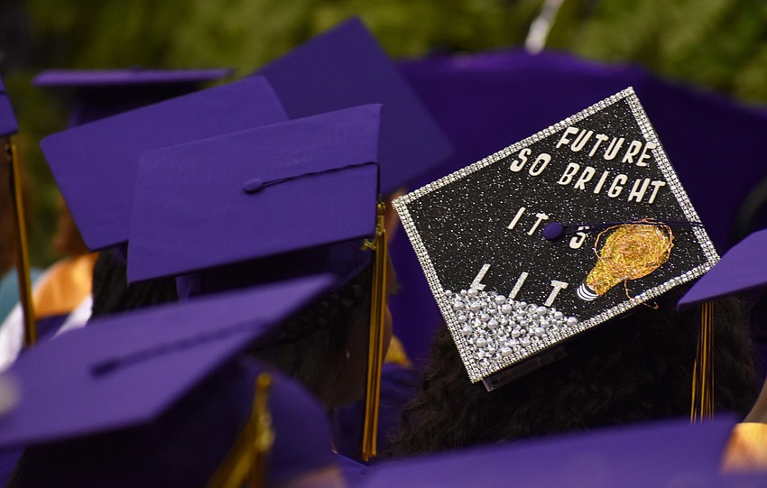 Students show off their creativity via their graduation caps during the Booker High School Graduation on June 3 at Robarts Arena.