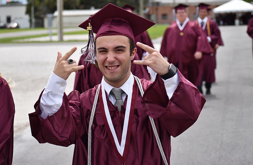 Students walk to the arena in line for the processional during the Riverview High School Commencement Ceremony on June 3 at Robarts Arena.