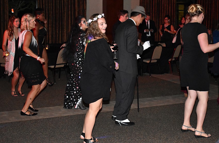Guests dance to the Cupid Shuffle at the YPG Throwback Gala on June 3 at Gold Coast Eagle Distributing