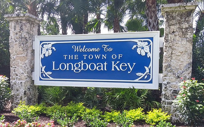 Even though Longboat Key is one town, that county line has always made the town and its residents feel split.