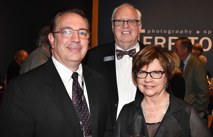 John Frazee with Mike and Marie Pender