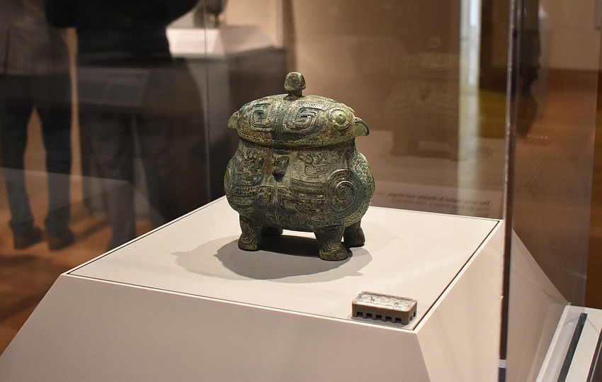 Many vessels such as this You wine vessel in double owl shape from the 12th-11th C BCE are on display at the Eternal Offerings: Chinese Ritual Bronzes exhibit at The Ringling.