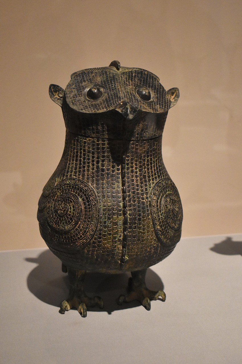 Many vessels such as this Zun wine vessel in the shape of an owl from the late Shang dynasty are on display at the Eternal Offerings: Chinese Ritual Bronzes exhibit at The Ringling.