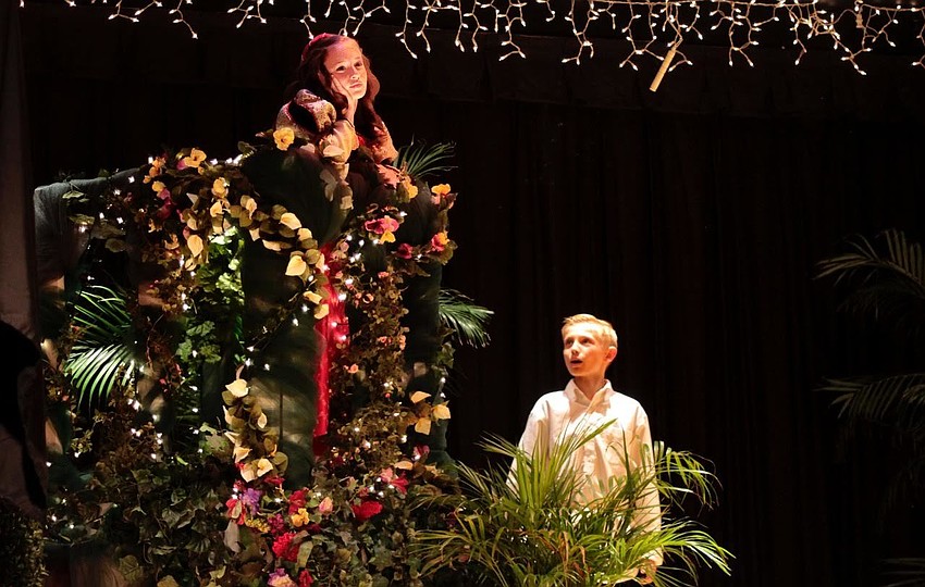 Juliet (Liza Strong) and Romeo (Will Hall) in Capulet’s garden outside Juliet’s bedroom.