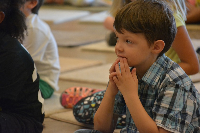 East County's Tate Powell, 6, listens to 