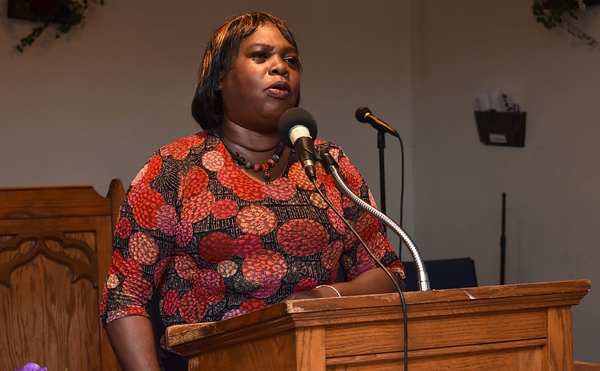 Second Chance Last Opportunity Founder April Glasco sings during Men of Purpose on June 10 at Mount Calvary First Baptist Church.