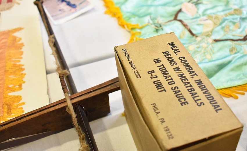 George McKee brought his extensive Vietnam War memorabilia collection to share with guests at Red, White & Brew on June 10 at Gold Coast Eagle Distributing.