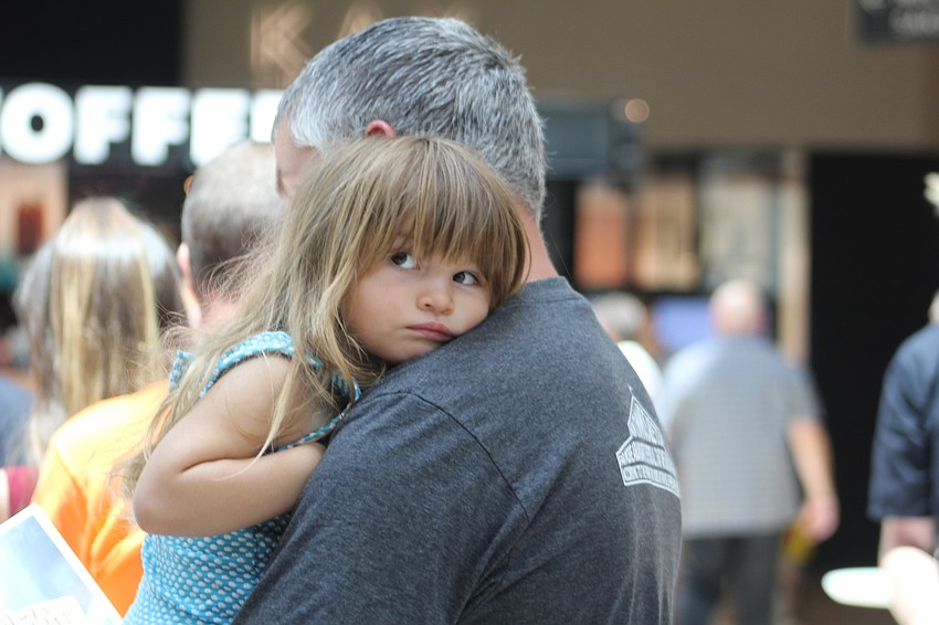 Parrish's Emma and James Pearson snuggle up during Dad's Day.