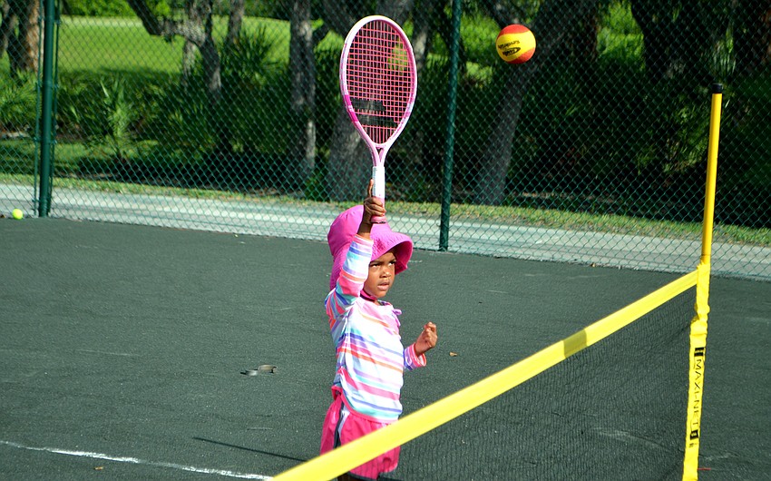Sofia Grace Harris eyes the ball as it sails toward her.