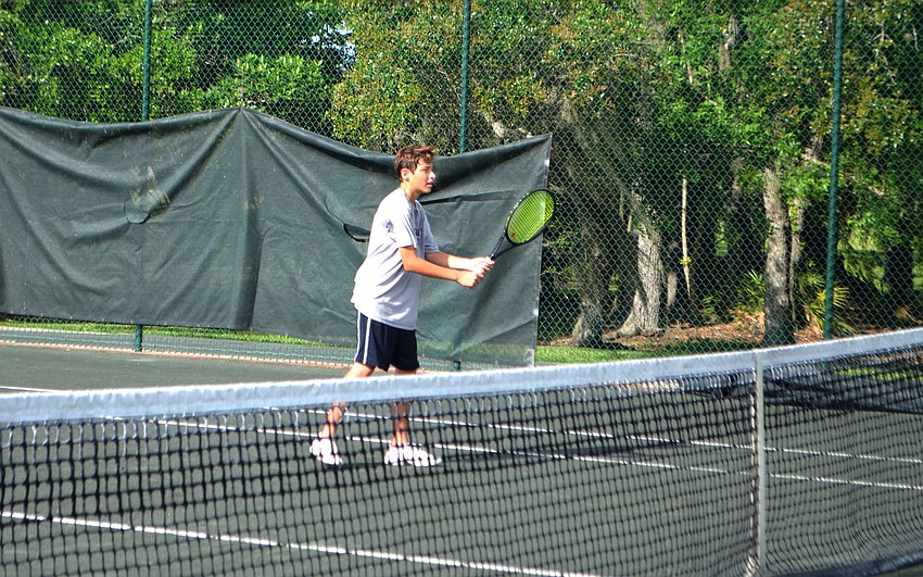 Nathan Moon waits for the ball to be served.