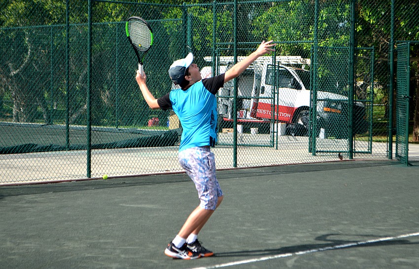 Michael Rapp serves the ball during the Longboat Key Club’s Sports Camp on June 21.