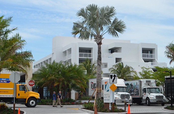 Workers put the finishing touches on the Zota Beach Resort on Longboat Key on Wednesday.