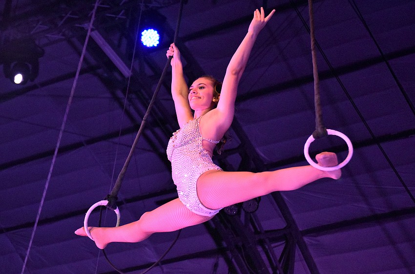 Teresa Powell performs on the Roman Rings.