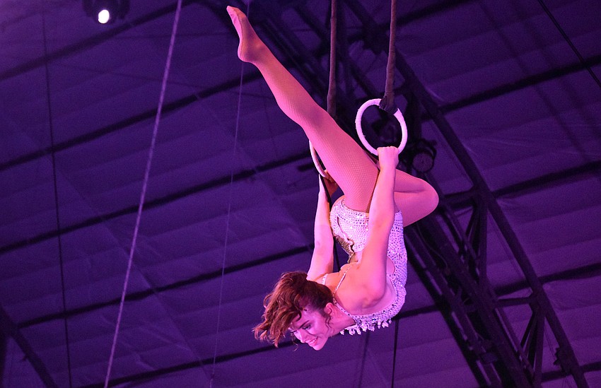 Teresa Powell performs on the Roman Rings.