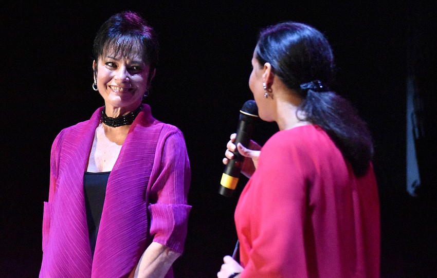 CAC Co-Founder and Associate Director Dolly Jacobs smiles as CAC Managing Director Jennifer Mitchell says this show in D.C. wouldn’t have happened if it weren’t for Jacobs winning the NEA National Heritage Fellowship in 2015.