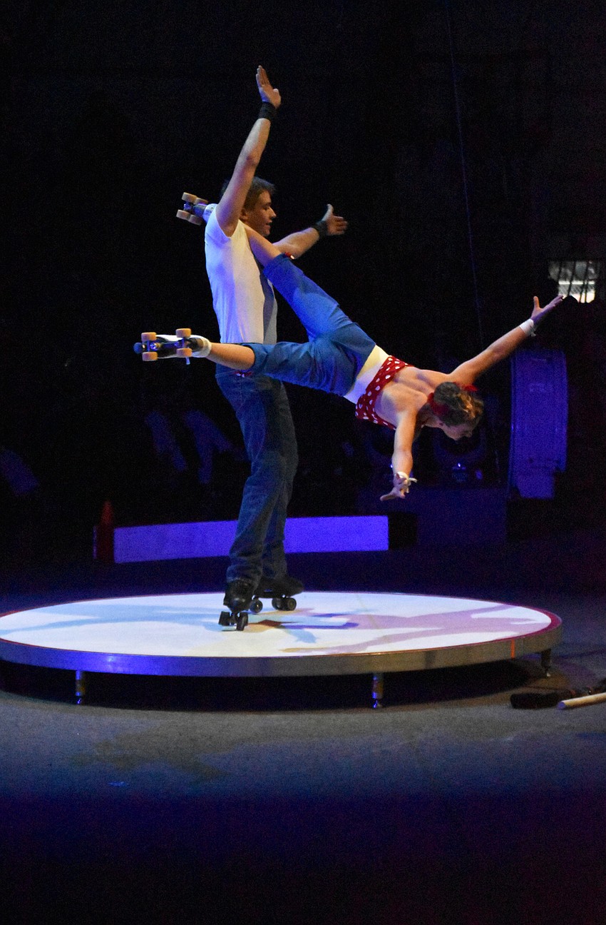 Jake Peterman and Rylee Roulette perform an Acrobatic Roller Skating trick.