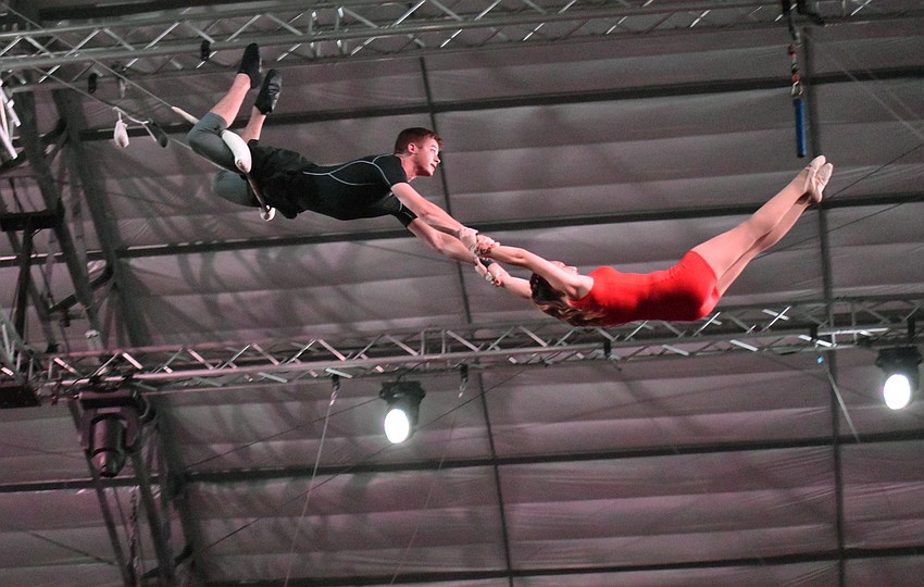 Jake Peterman catches Sarah Barg on the Flying Trapeze.