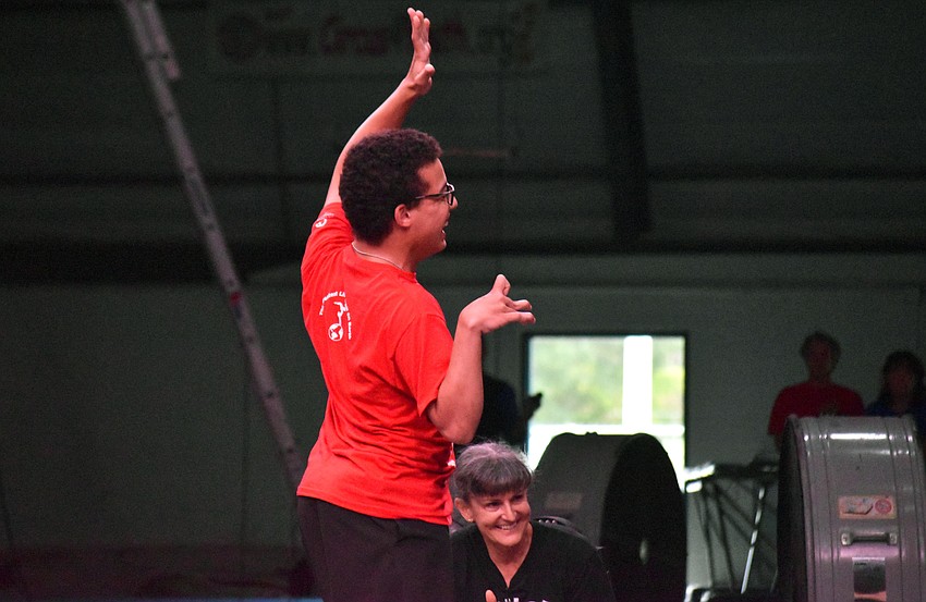 Silas Bichler smiles after completing his juggling routine.