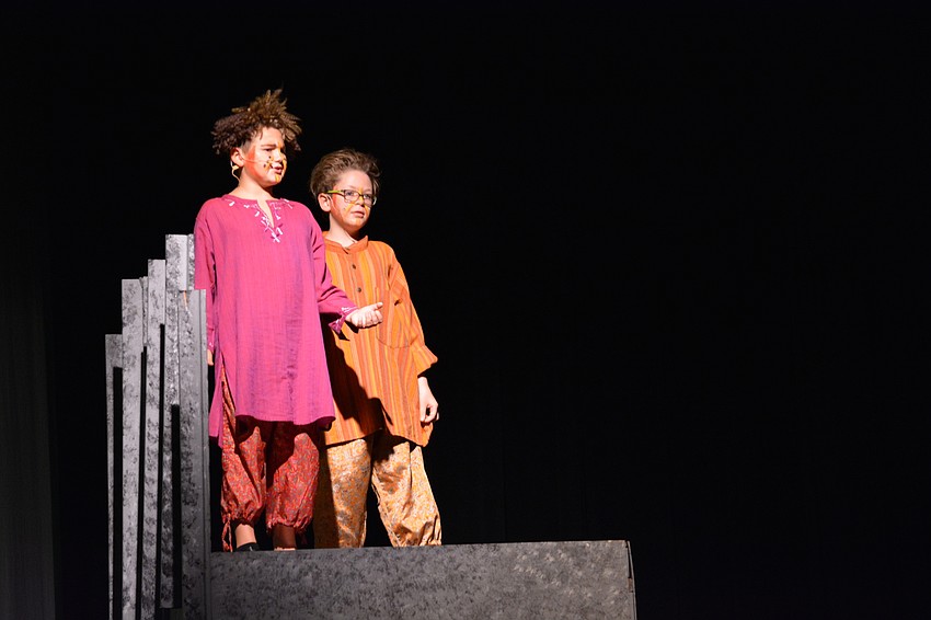 Corbin Hynson, as the lead lion Mufasa, tells his son Simba, played by Ethan Hall, about the circle of life.