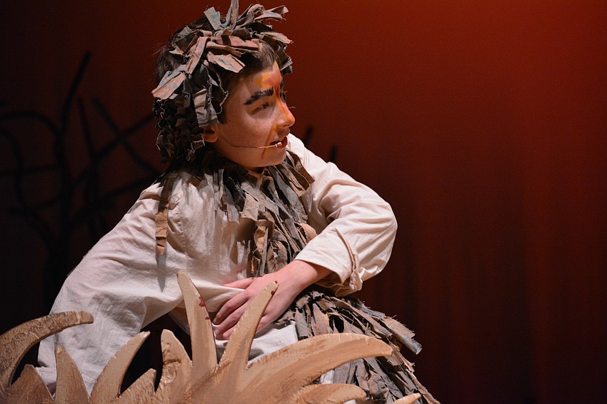 Connor Henning, as Scar, pretends to apologize to the young Simba.