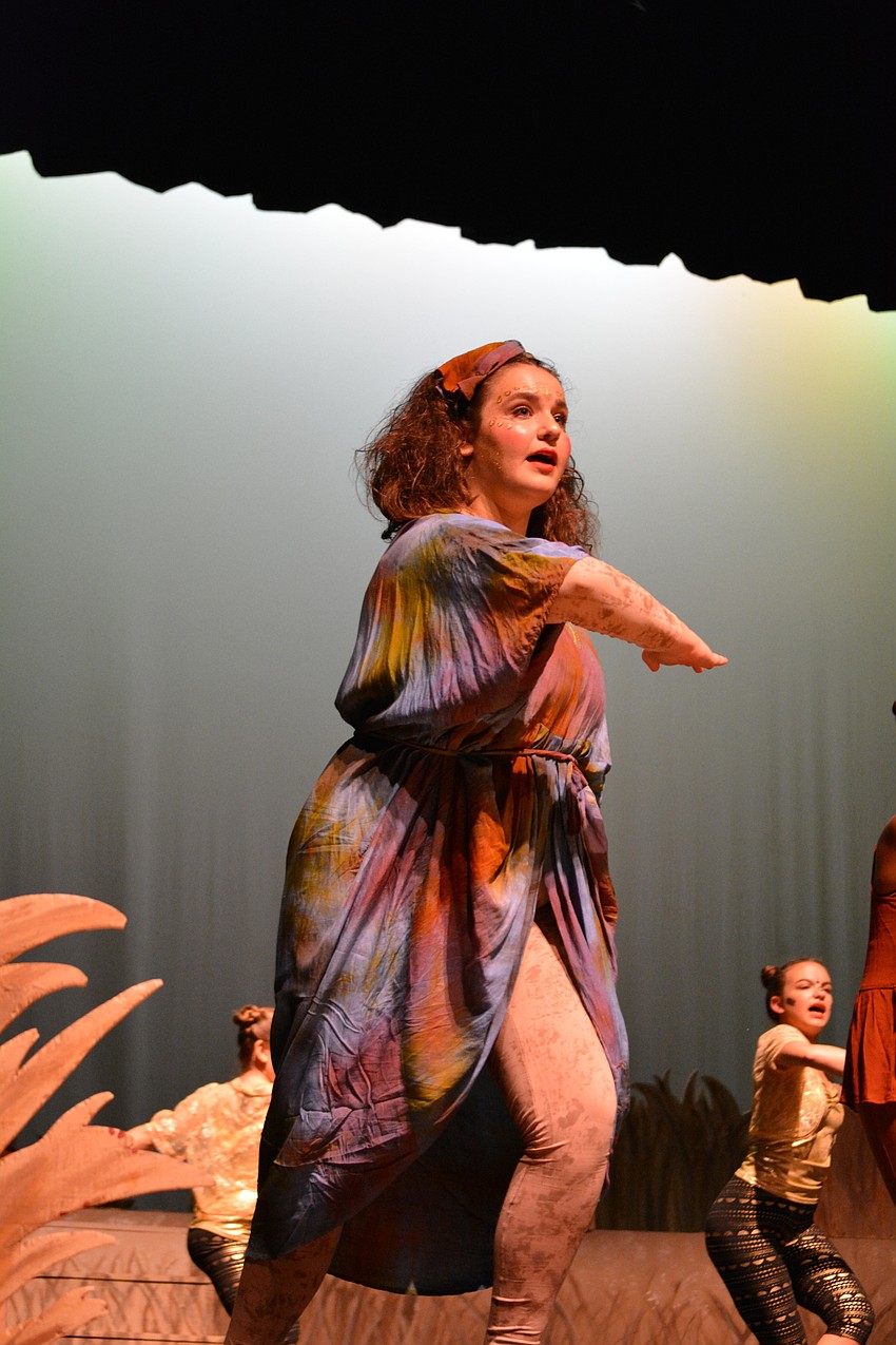 Jordan Cangro, as the lioness Sarafina, dances.