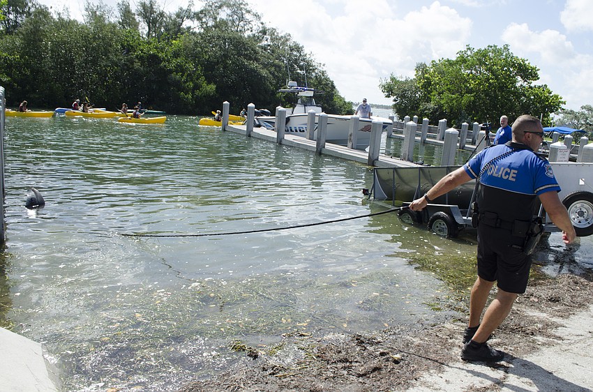 Montegna helped move the whale closer to the trailer for transport onto dry land.