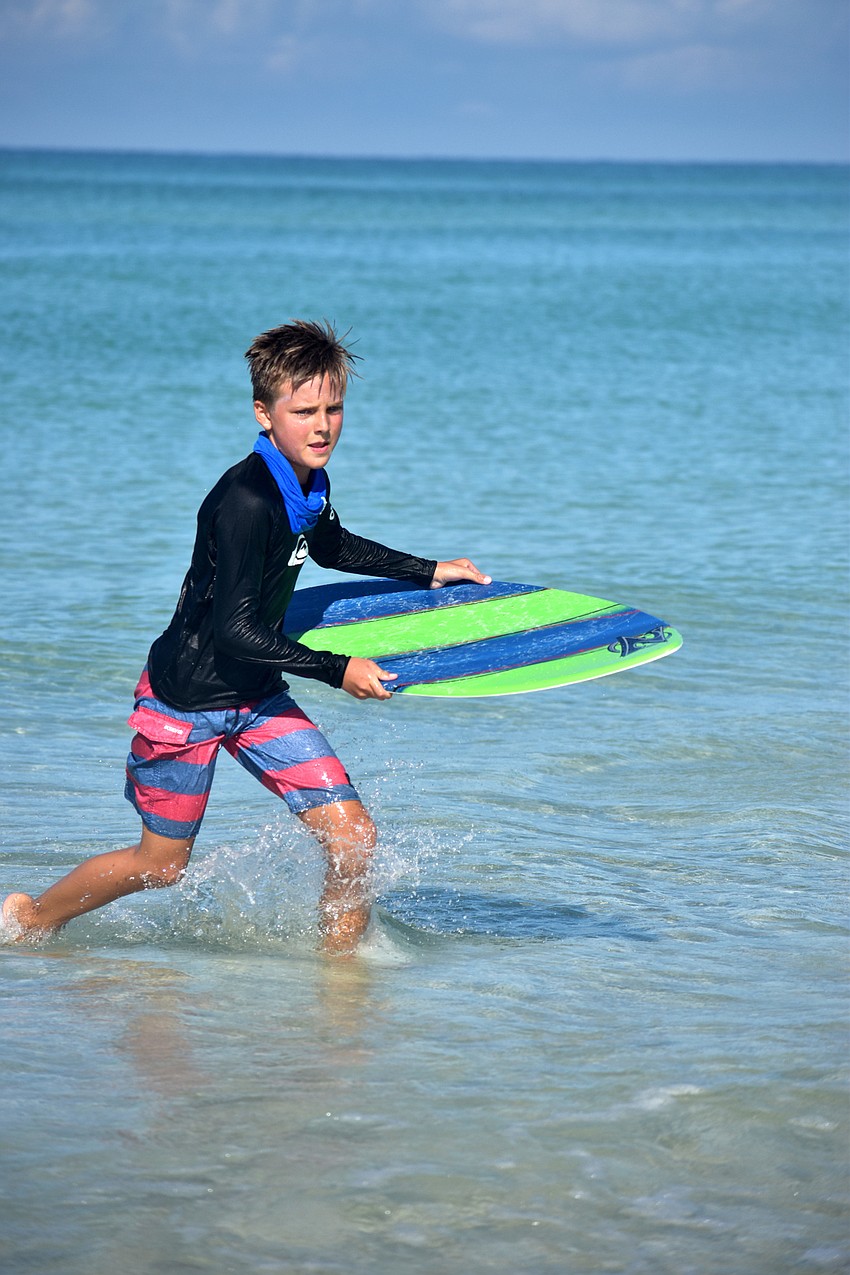 Max Freeman gets ready to catch a wave.