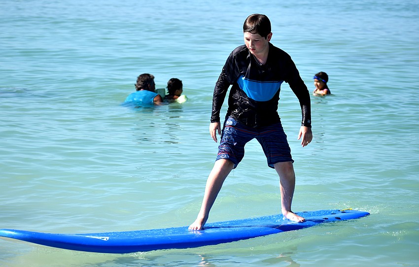 Magnus Shannon rides a wave into shore.