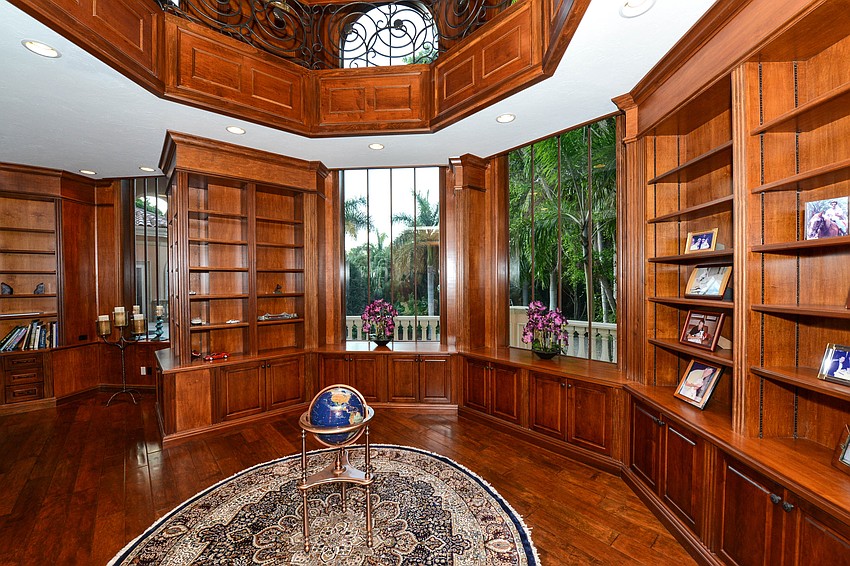 Other luxury touches inside the residence include a two-story library modeled after the Biltmore Hotel.