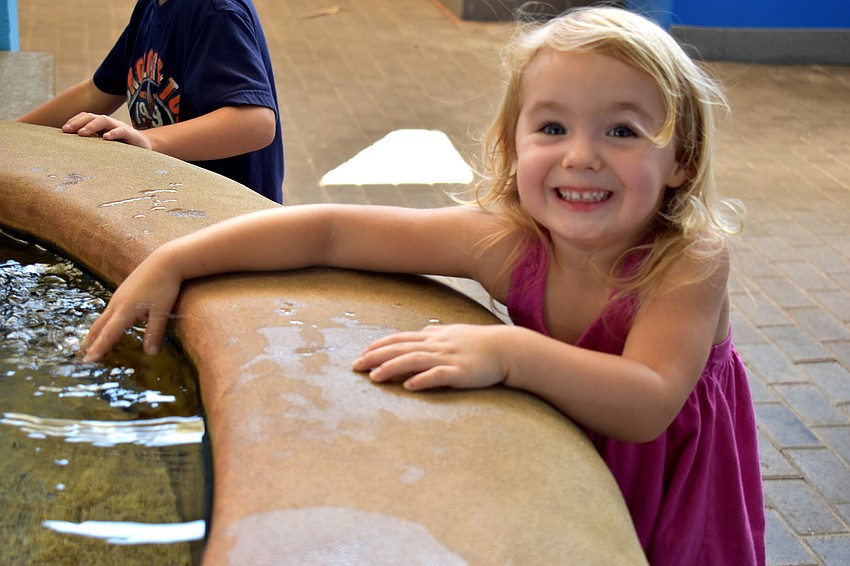 Jaedyn Palladay is all smiles during Mote’s Fins and Fun Family Festival.
