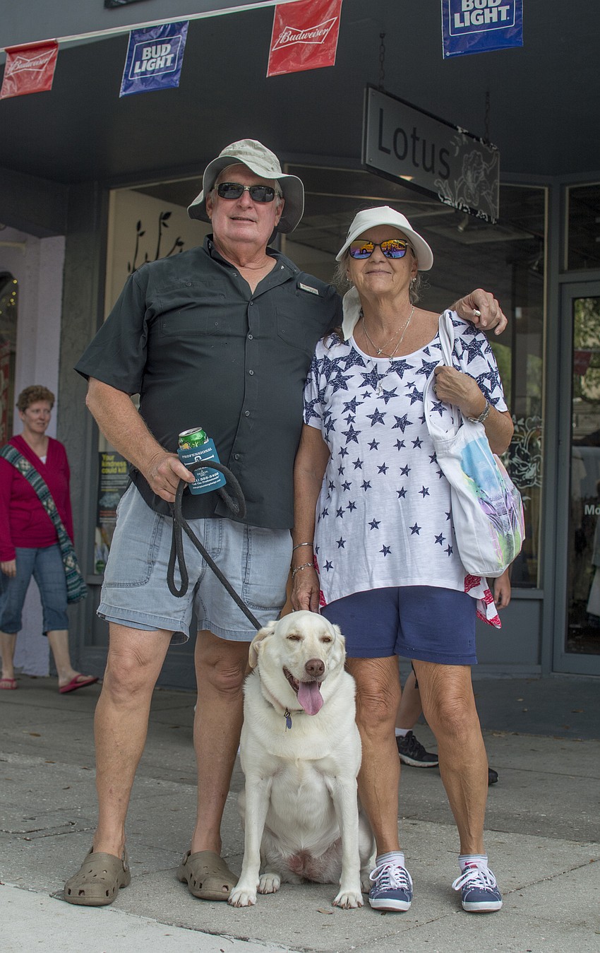 Jeff and Kay Ochs pose with their dog Pearl.