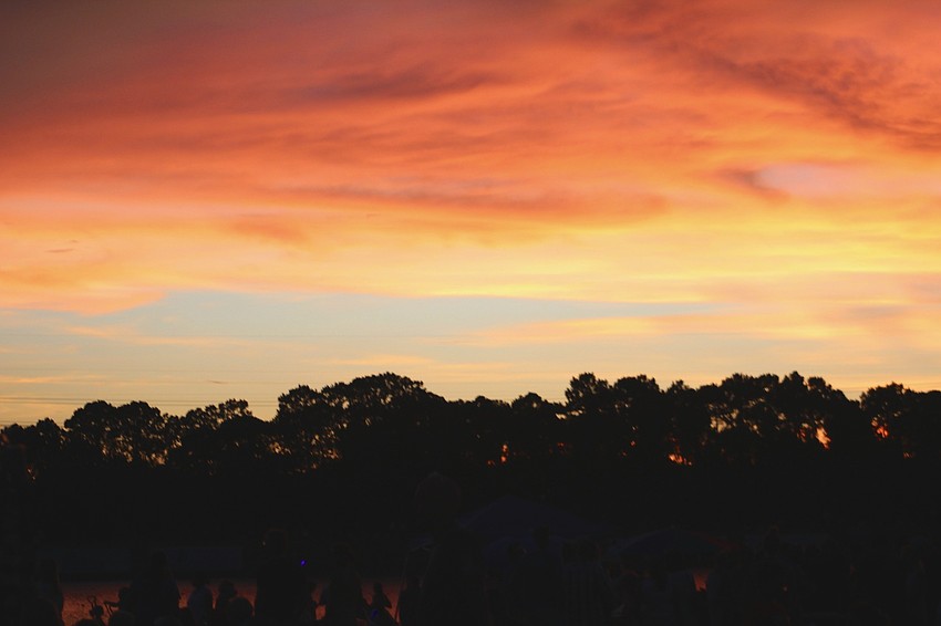The sun sets just before the fireworks show at Nathan Benderson Park.