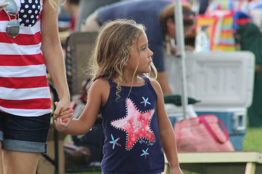 Sarasota's Lilyana Sanchez is dressed for the occasion before the fireworks show.
