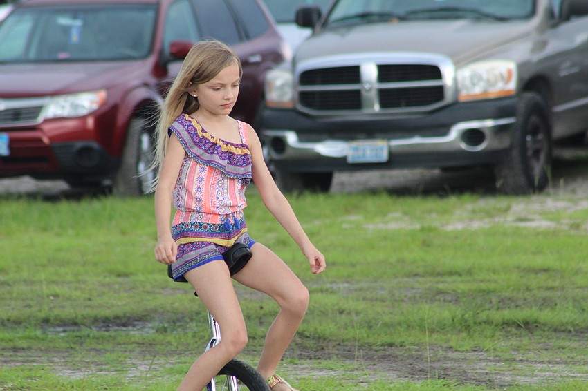 Bradenton's Phoebe Chase shows off her unicycle skills.