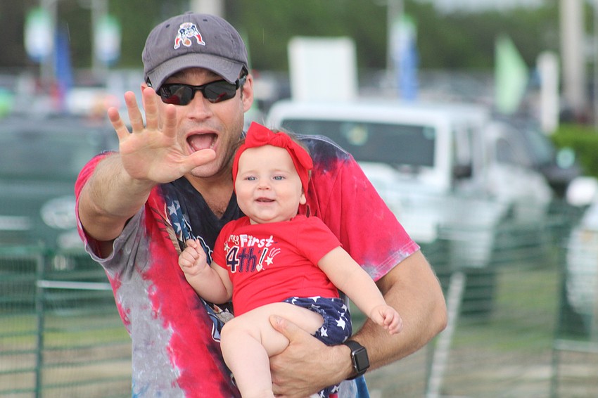 Lakewood Ranch's Matt and Macklynn Hiller have some fun at the Fourth of July event at Nathan Benderson Park.