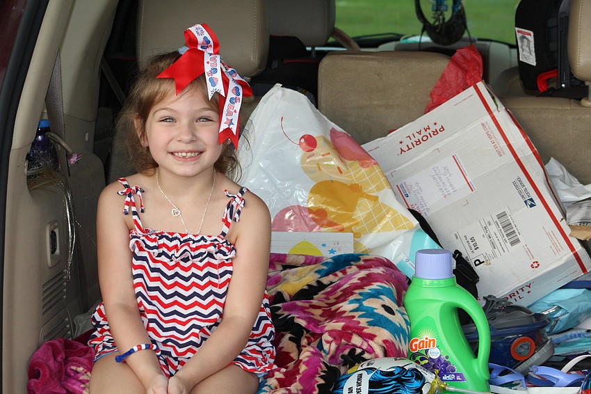 Lakewood Ranch’s Harper Warber is excited for the start of the fireworks show.