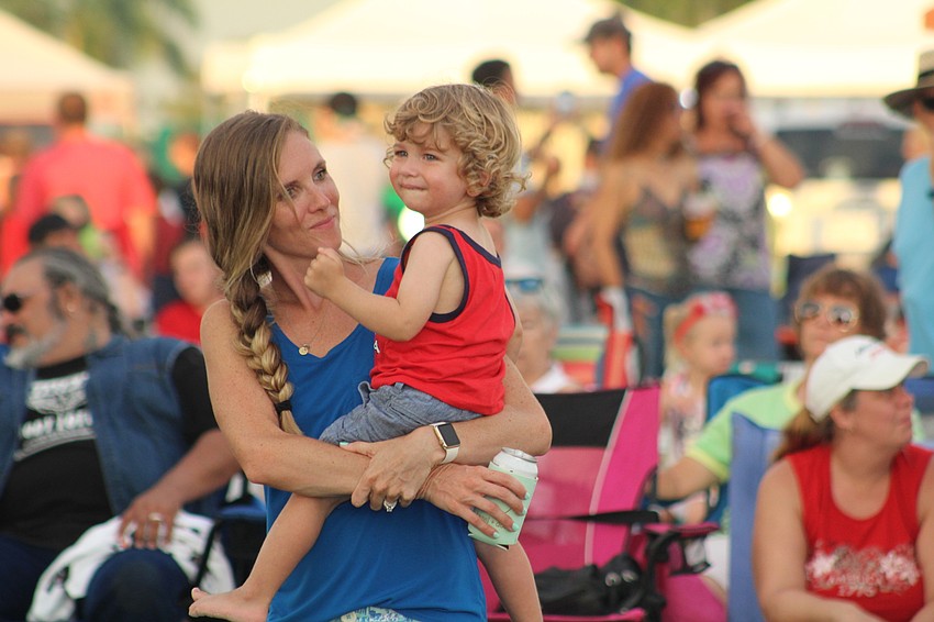 Lakewood Ranch's Christina and Will Elias rock out together to the live band.