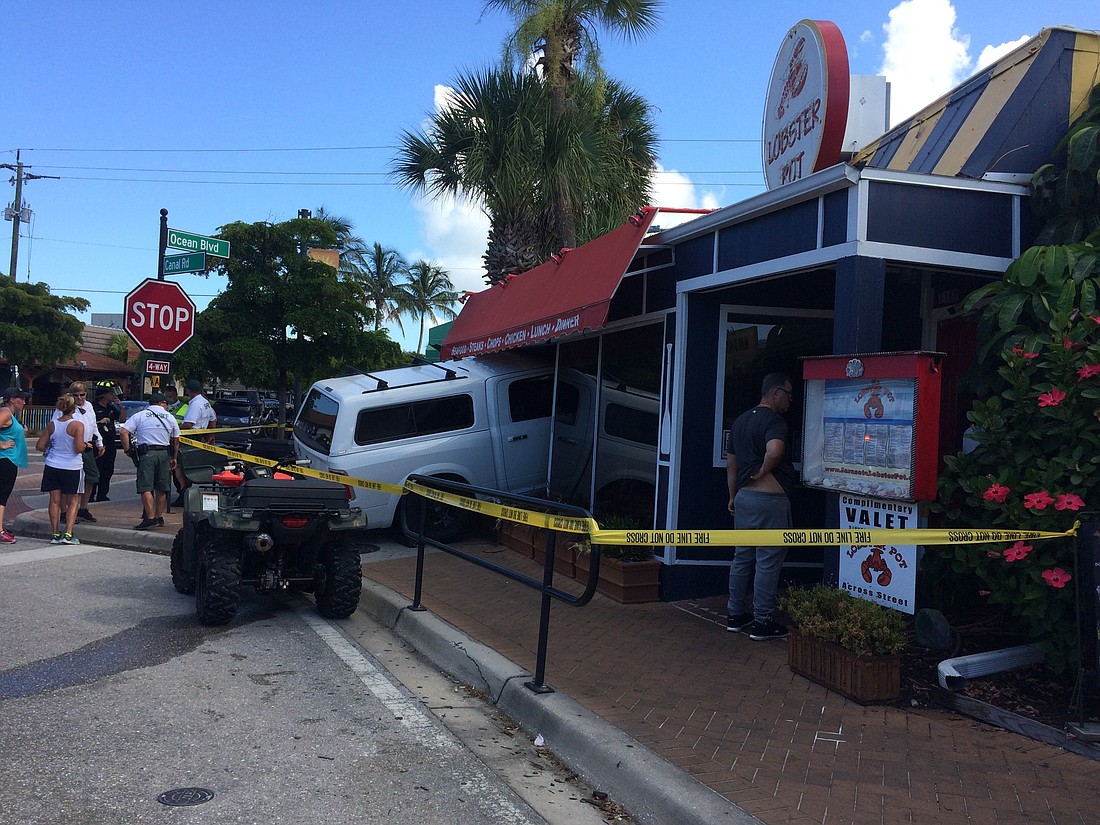 A truck crashed into the front of the Lobster Pot restaurant on the Fourth of July, and holiday traffic is preventing it from being removed.  Photo courtesy Alex Mahadevan.