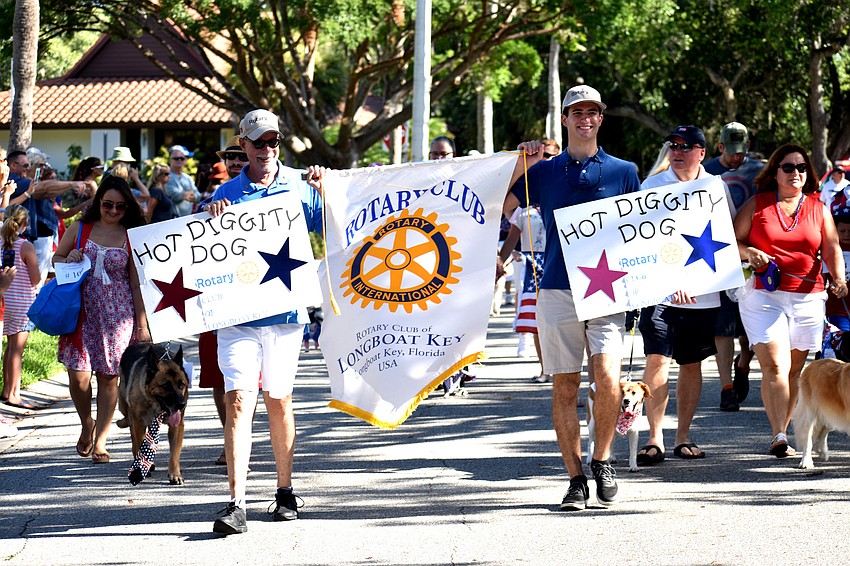 The Rotary Club of Longboat Key makes its way down the parade route.