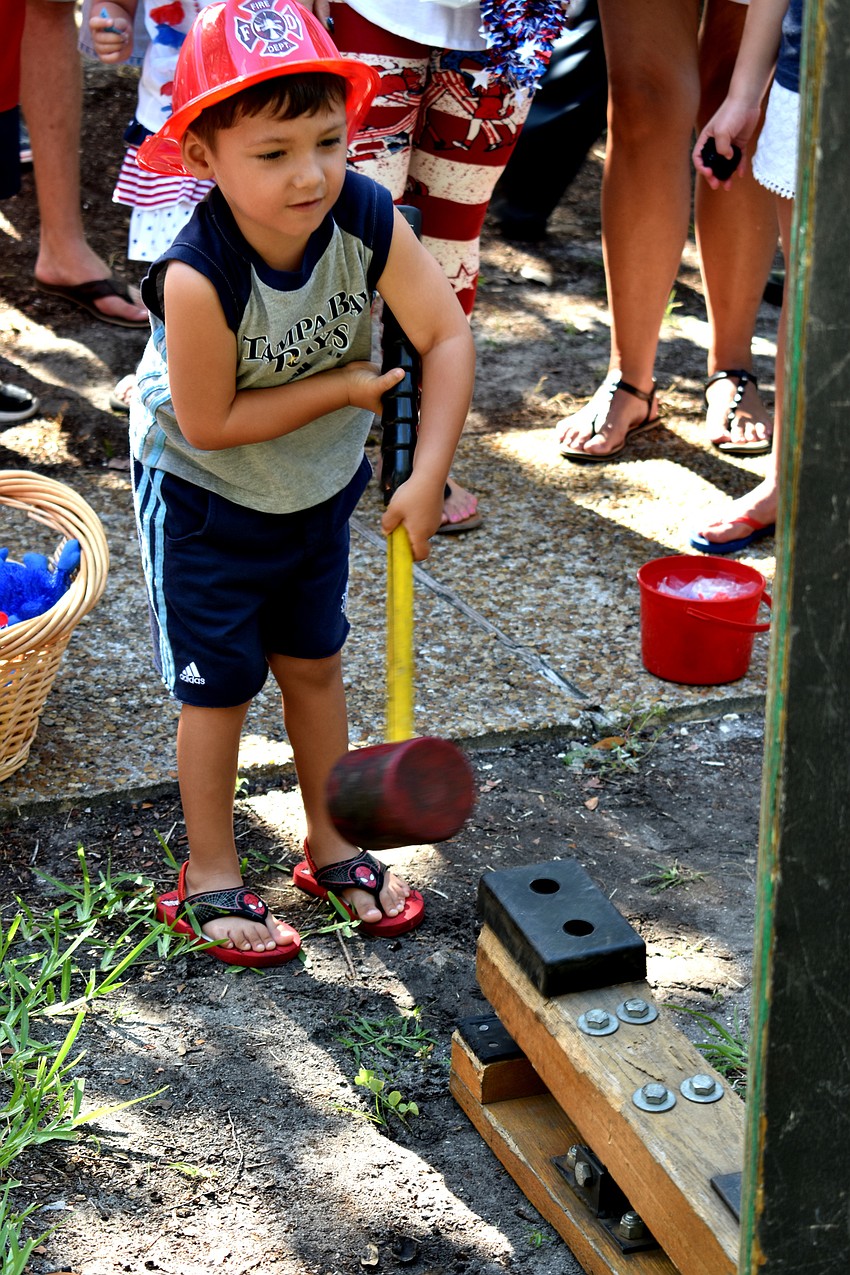 Joey Montague takes a shot at one of the games following the parade.