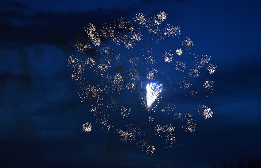 Fireworks illuminate the sky over Sarasota Bay.