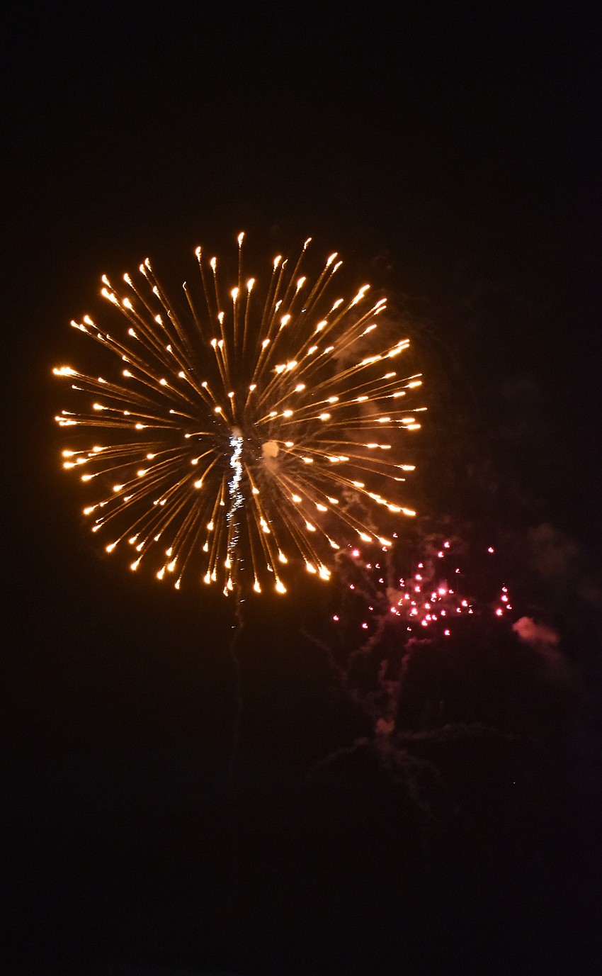 Fireworks illuminate the sky over Sarasota Bay.