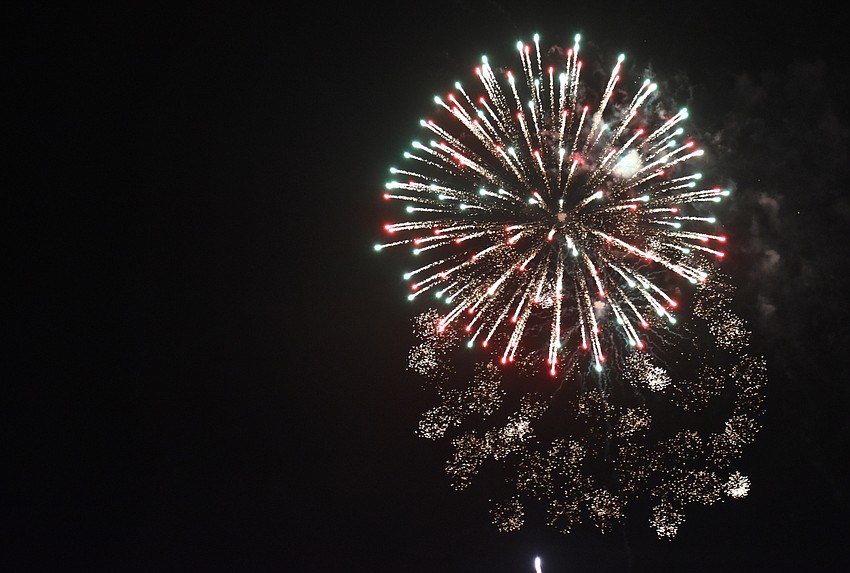 Fireworks illuminate the sky over Sarasota Bay.
