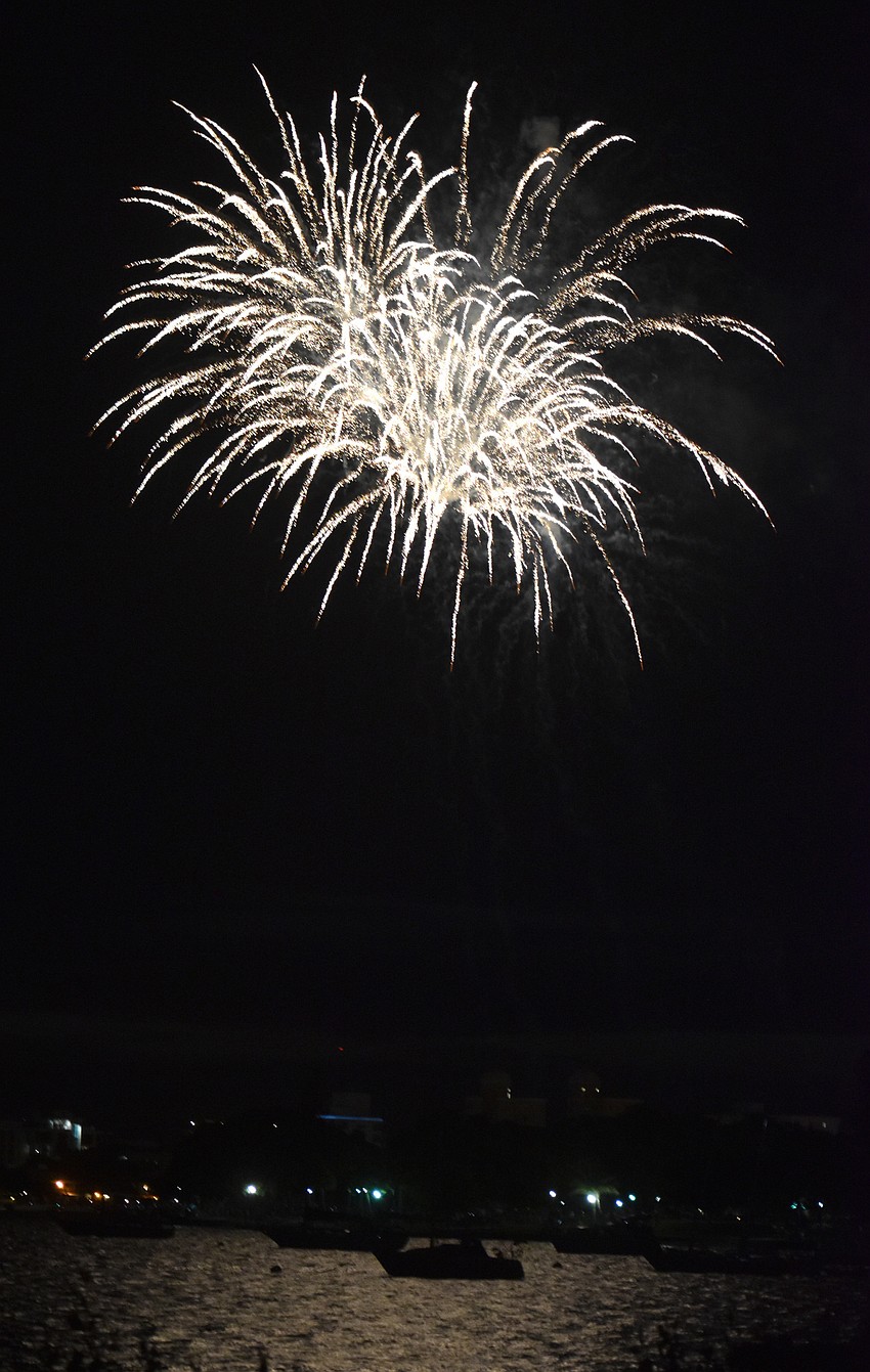 Fireworks illuminate the sky over Sarasota Bay.