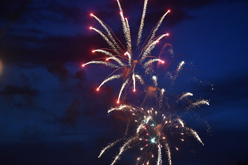 Fireworks illuminate the sky over Sarasota Bay.